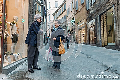 Women talking on street of Siena city Editorial Stock Photo