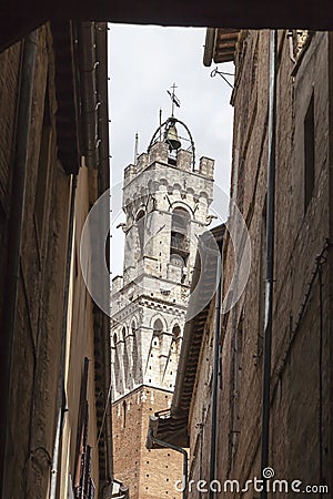 Sienna, Torre del Mangia (Palazzo Pubblico) at the Piazza del Campo, Tuscany, Italy, Stock Photo