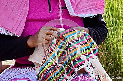 Sierra Chincua, Michoacan, Mexico, January 14: Indigenous woman sews clothes Editorial Stock Photo