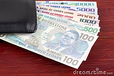 Sierra Leonean money in the black wallet Stock Photo