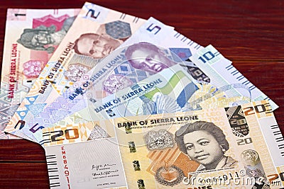 Sierra Leonean money a business background from new series of banknotes Stock Photo