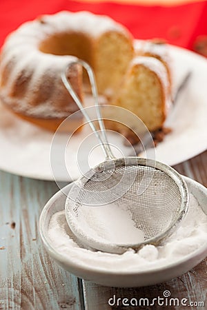 Sieve with powdered sugar Stock Photo