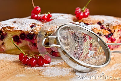 Sieve with powdered sugar Stock Photo