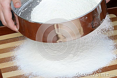 Sifting a flour Stock Photo