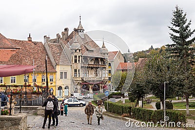 Fragment of Hermann Oberth square, near to the entrance to the old town in Sighisoara city in Romania Editorial Stock Photo