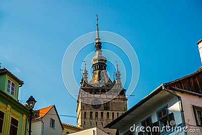 Sighisoara, Romania: Old building in Sighisoara citadel. Tower Clock in Sighisoara Stock Photo