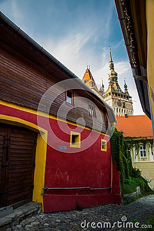 Sighisoara, Romania: Old building in Sighisoara citadel. Tower Clock in Sighisoara Stock Photo