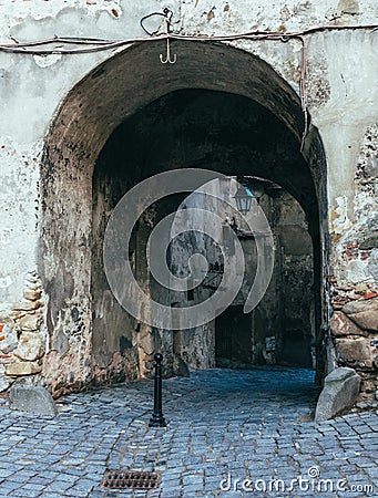 Street of an ancient city in Europe. Romanian city of Sighisoara Stock Photo