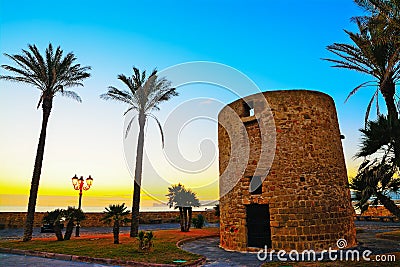 Sighting tower by the sea at dusk Stock Photo