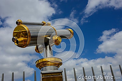 Sightseeing golden and steel Telescope Stock Photo