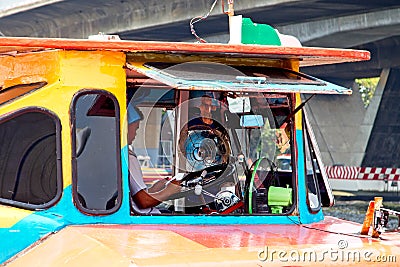 A sightseeing tour boat captain prepares for his next trip Editorial Stock Photo