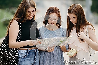 Sightseeing, travel, vacation, city tour. Happy women tourists t Stock Photo