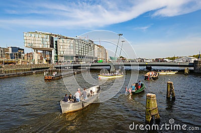 Sightseeng in front of DoubleTree Hilton hotel, around the Central Station of Amsterdam Editorial Stock Photo