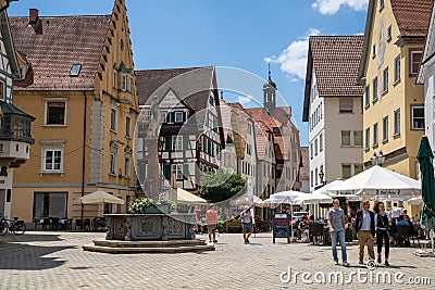 Tourists enjoy a day out in the historic old city center of Sigmaringen Editorial Stock Photo