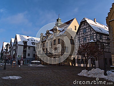 Historic town hall with yellow painted facade located at a square in pedestrian zone in city center. Editorial Stock Photo