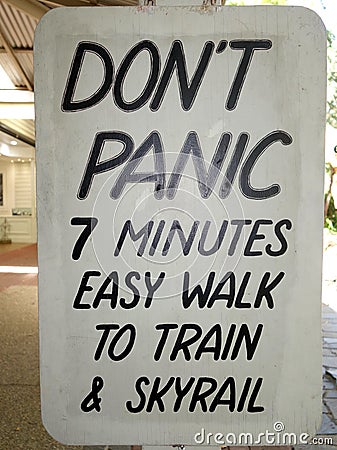 A sign advising only 7 minutes walk to transport Stock Photo