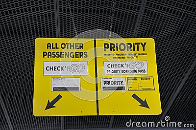 Sign at Airport for Priority and Normal Passengers Editorial Stock Photo