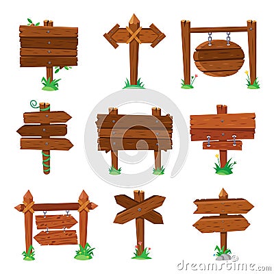 Sign boards in green grass. Wooden plank road signs, wood signboard or isolated signpost board cartoon vector set Vector Illustration