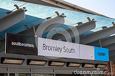 Sign for Bromley South Railway Station showing the Southeastern logo and Oyster logo Editorial Stock Photo