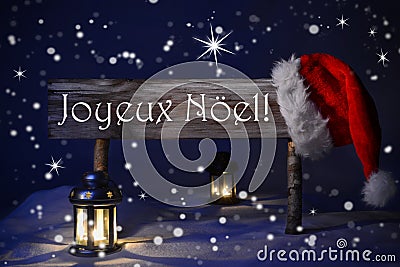 Sign Candlelight Santa Hat Joyeux Noel Means Merry Christmas Stock Photo