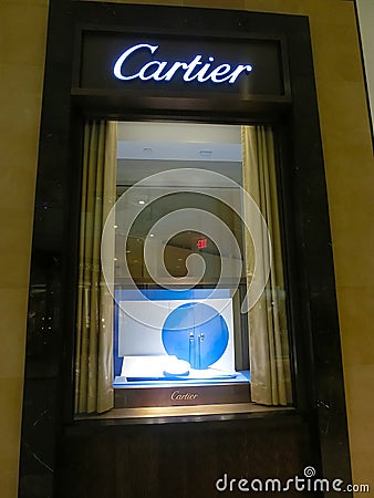 Sign with Cartier logo at shopwindow of Cartier store in Aventura Mall, Florida Editorial Stock Photo