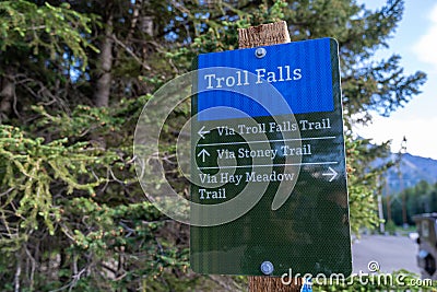 Sign directing hikers to Troll Falls in Kananaskis Country Alberta Canada, along with Hay Meadow and Stoney Trail Editorial Stock Photo