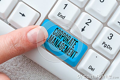 Writing displaying text Corporate Management. Concept meaning all Levels of Managerial Personnel and Excutives Typing Stock Photo