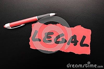 Sign displaying Legal. Business overview Allowable or enforceable by being in conformity with the law Stock Photo