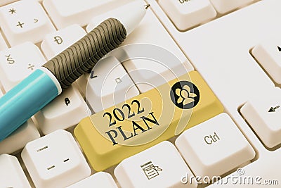 Hand writing sign 2022 Plan. Business approach Challenging Ideas Goals for New Year Motivation to Start Typist Creating Stock Photo