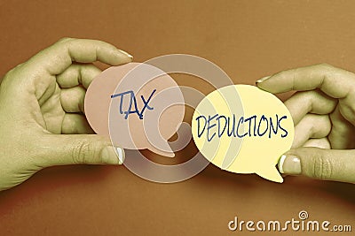 Sign displaying Tax Deductions. Word for reduction income that is able to be taxed of expenses Brainstorming Problems Stock Photo