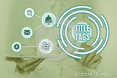 Sign displaying Title Tags. Concept meaning the HTML element that specifies the title of a web page Lady Holding Tablet Stock Photo