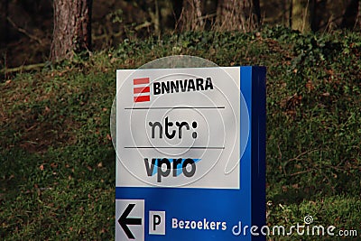 Sign at the entrance of broadcast organizations BNNVARA, NTR, VPRO at the media park in Hilversum, the Netherlands Editorial Stock Photo