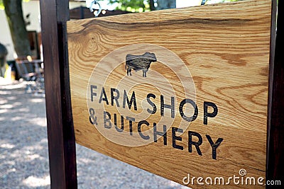 Sign for a farm shop and butchery Editorial Stock Photo