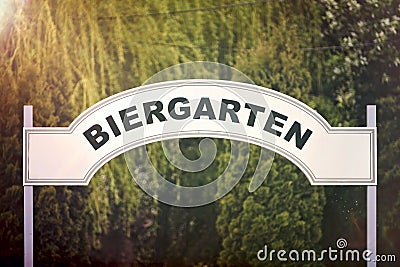 Sign with german inscription `Biergarten` meaning beer garden. Stock Photo