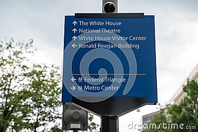 Washington, DC - August 7, 2019: Sign gives directions to famous DC landmarks for tourists White House, National Theater, DC Editorial Stock Photo