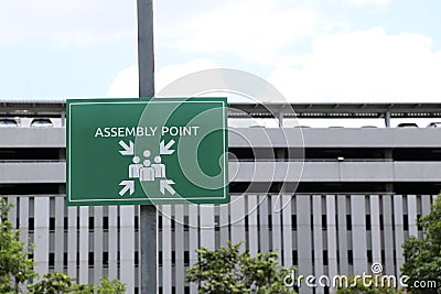 A sign indicating the assembly point in the event of a fire. Stock Photo