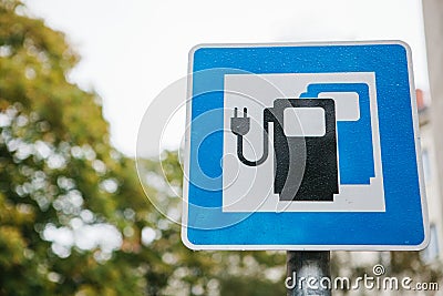 A sign indicating a special place for charging electric vehicles. A modern and eco-friendly mode of transport. Stock Photo