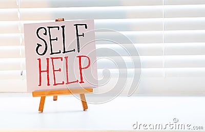 Sign or indication for book category, genre or section at book store. Self help word Stock Photo