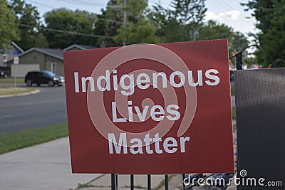 Sign indigenous lives matter at the memorial at catholic church in tribute to 215 indigenous aboriginal children Editorial Stock Photo