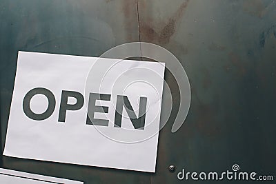 The sign with the inscription in the cafe on the door `Open Stock Photo