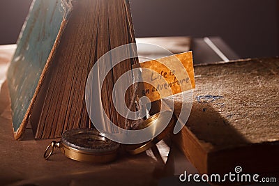 Sign Life is an adventure concept photo with vintage books - Vocation background. Stock Photo