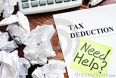 Sign Need help in tax deduction. Stock Photo