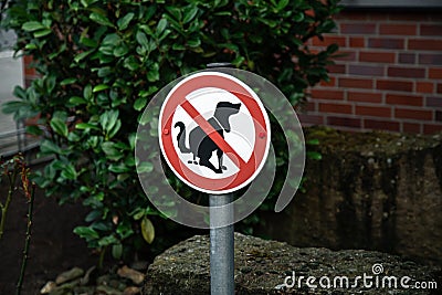 A sign no dog poop . Concept cleaning up dog droppings. Stock Photo