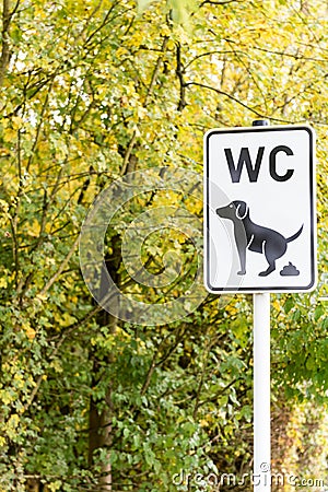 Sign No Dog Poop in a park Stock Photo