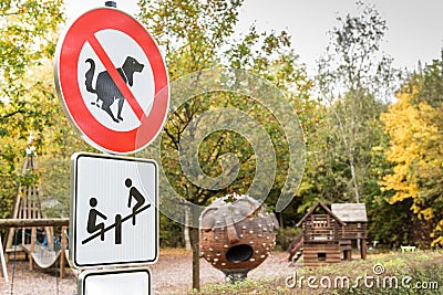 Sign No Dog Poop in a playground Stock Photo