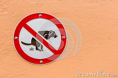 Sign No Dog Poop on the wall Stock Photo