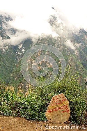 Sign on path to Haba Xueshan Stock Photo