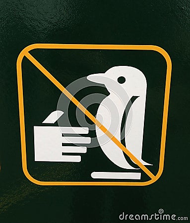 Sign of penguin crossing do not touch Stock Photo