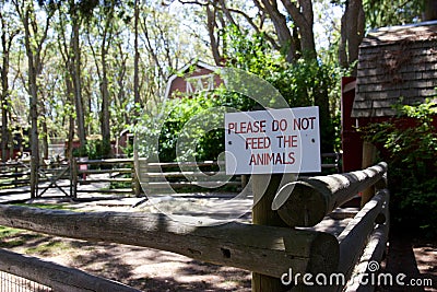 Sign in petting zoo: Do not feed the animals Stock Photo