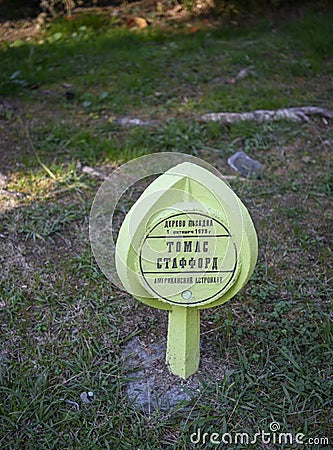 Sign for planting a tree by Thomas Stafford American Astronaut in Riviera Park Editorial Stock Photo